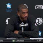 Kevin Ollie reacts to his first home win as the Nets' interim head coach
