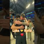 Kyrie Irving and Luka Doncic embrace after defeating OKC Thunder