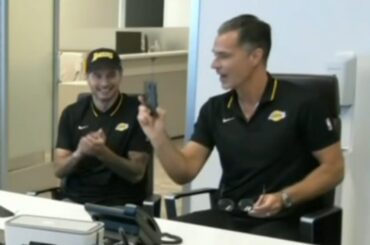 JJ Redick and Rob Pelinka celebrate drafting Bronny James with pick 55 in NBA Draft