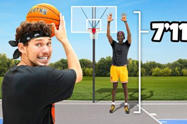 I Took 100 Shots vs World's Tallest Basketball Player and Scored ___