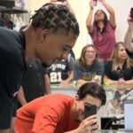 Spurs’ phenom Victor Wembanyama surprises fans at sports card store on Northwest Side