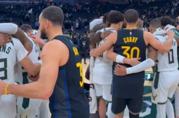 Steph Curry sneaks in and joins the Milwaukee Bucks prayer after the game