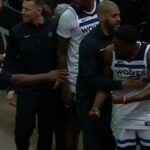 Anthony Edwards gets held back from Rockets fan and went to put his hands up 😳