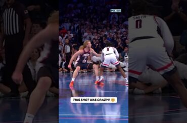 What an UNBELIEVABLE shot by Malachi Smith 🤯 #cbb #uconn #basketball