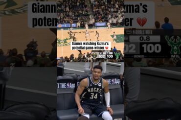 Giannis watching from the bench after calf injury 😔