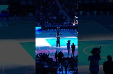 Hornets fan sinks a half court shot and then shows off his Dell Curry jersey!