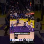 Luka Dončić beats the buzzer off of one leg and falling into the crowd 🤯 #nba