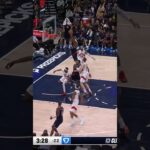 Garland lob behind backboard 👀